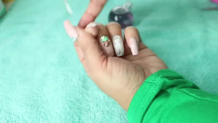 Apply cuticle oil around your nails and cuticles.