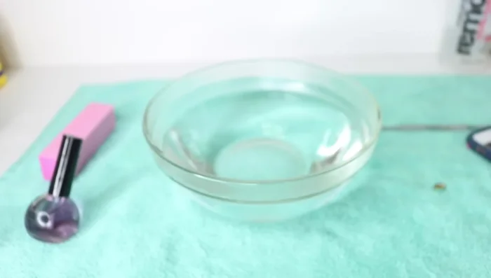 Soak fingers in a bowl of warm water with body wash (or added oil).