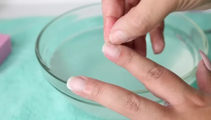 Pull the nails off from side to side.