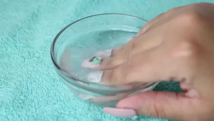 If nails are difficult to remove, continue soaking.