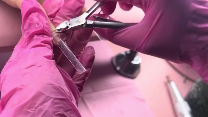 Blend nail tips using a 240 grit sanding band.