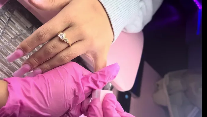 Clean the nails with Young Nails Swipe & Alcohol and a nail scrub. Alternatively, have the client wash their hands.