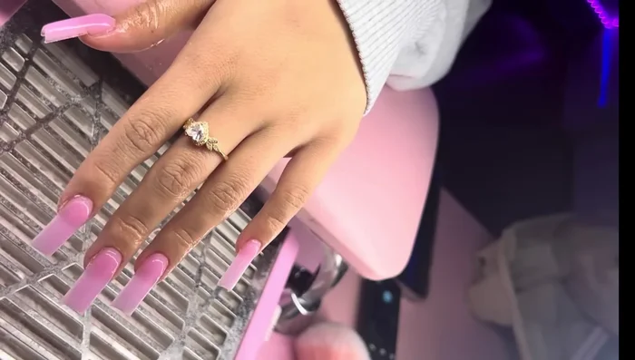 Clean the nails with Young Nails Swipe & Alcohol and a nail scrub. Alternatively, have the client wash their hands.