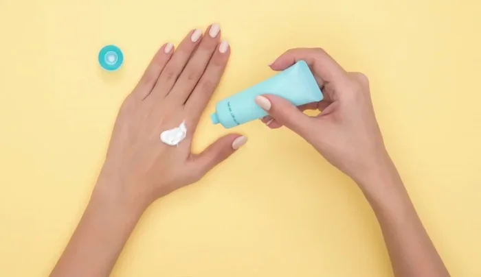 Apply SPF 30 broad-spectrum sunscreen liberally to your hands and around your nails before your manicure.