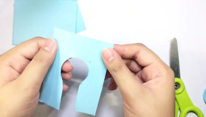 Apply tape to the top of the circle before cutting for easier removal later.