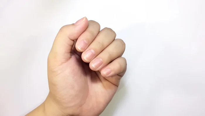 Prepare your natural nails; push back cuticles.