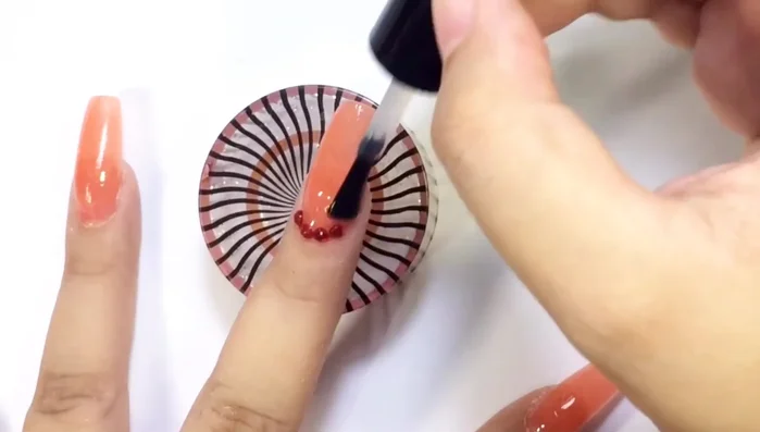 Apply a second layer of top coat.