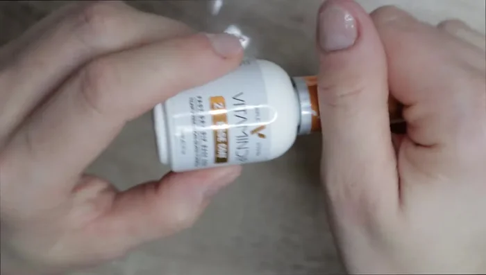 Apply a thin layer of nail glue to the side walls of the nail and any exposed free edge where sticky tabs don't touch.