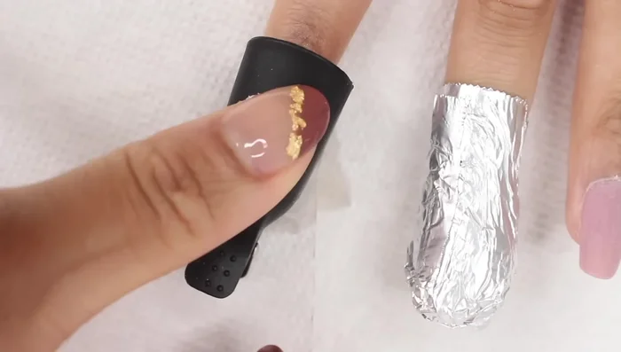 Leave it on until the dip powder softens; then gently rub or use an orange wood stick to remove.