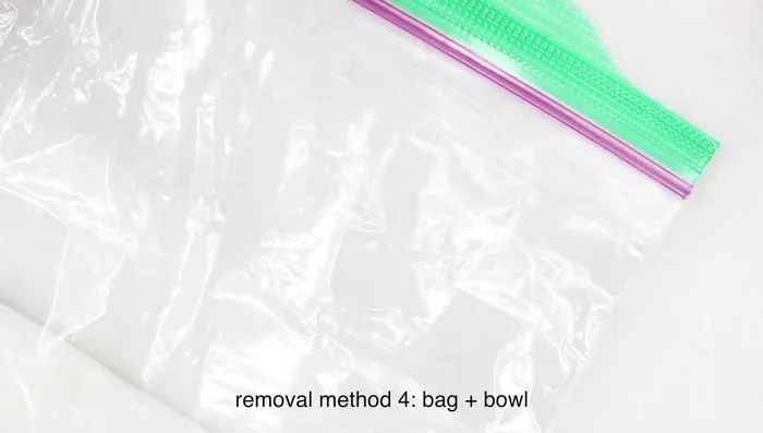 Remove the shiny top coat using a nail file (180 grit), e-file, or buffing block (medium grit).