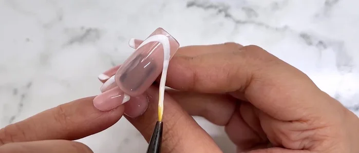 Connect the dots to form a smooth, round smile line.