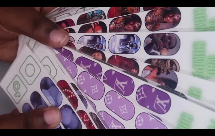 Cut out individual decals using a paper cutter and package in cellophane bags.