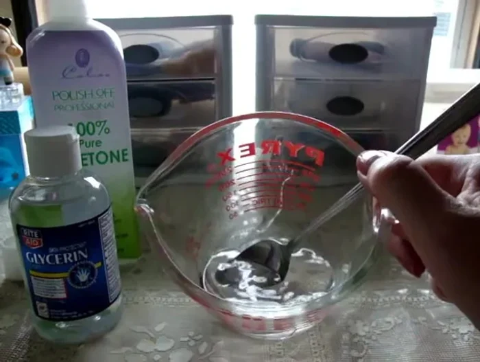 Pour the mixture into a sturdy container (the original acetone bottle is used in the video).