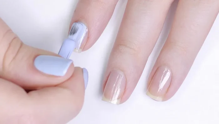 Apply a second thin layer of gel polish (if needed), capping the free edge and curing.