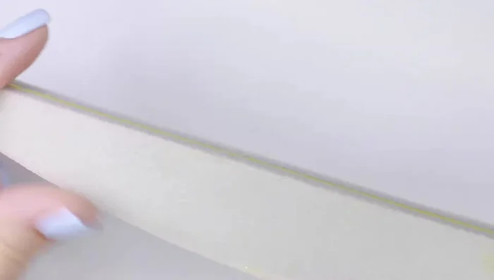 Apply primer (optional) to dehydrate nails and increase longevity.