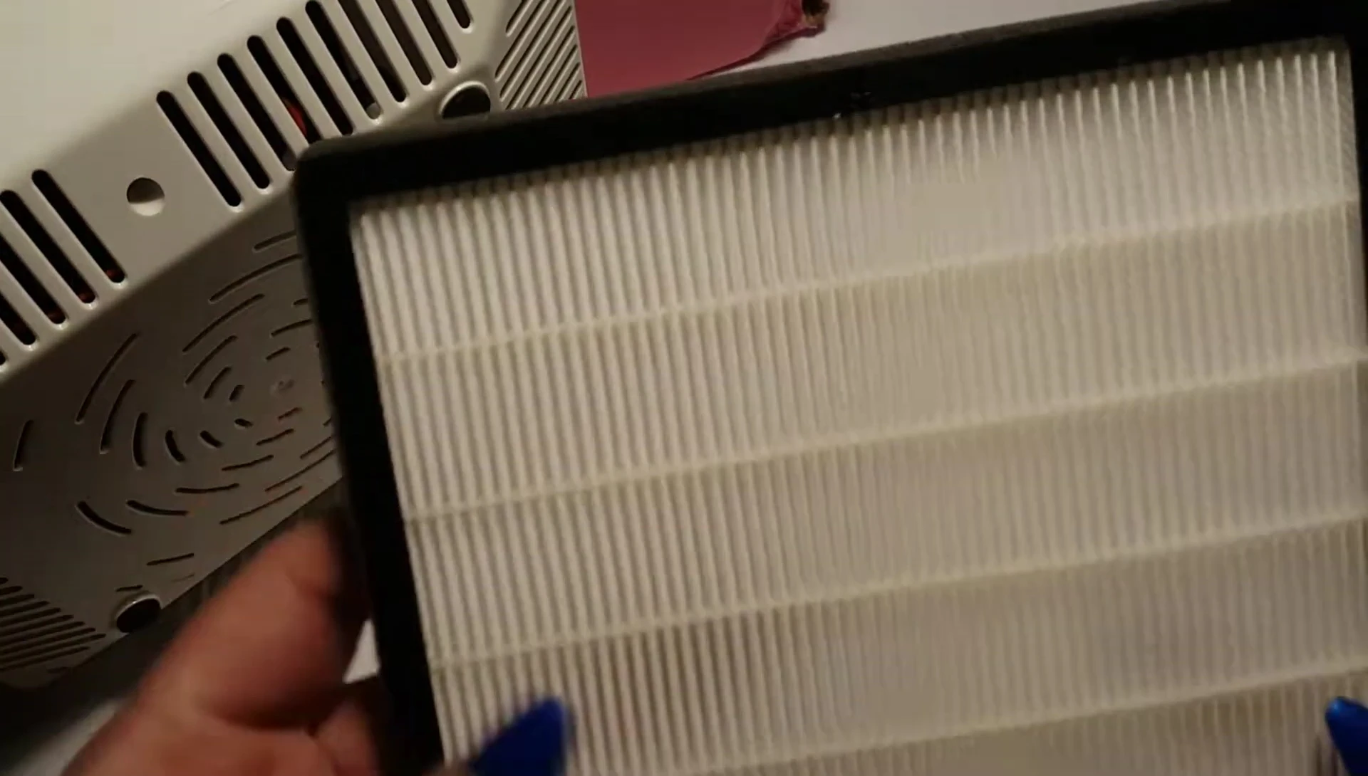 Damaged package, small device inside