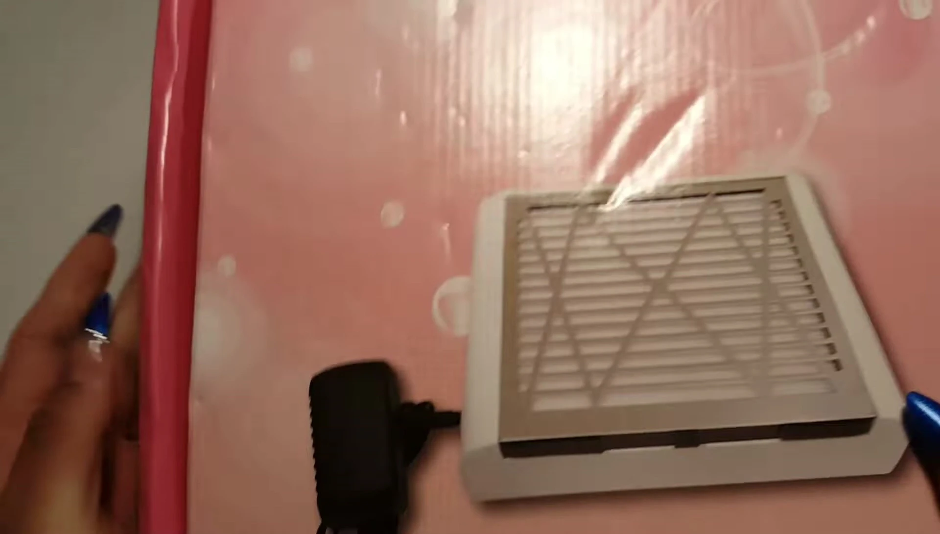 Damaged package, small device inside