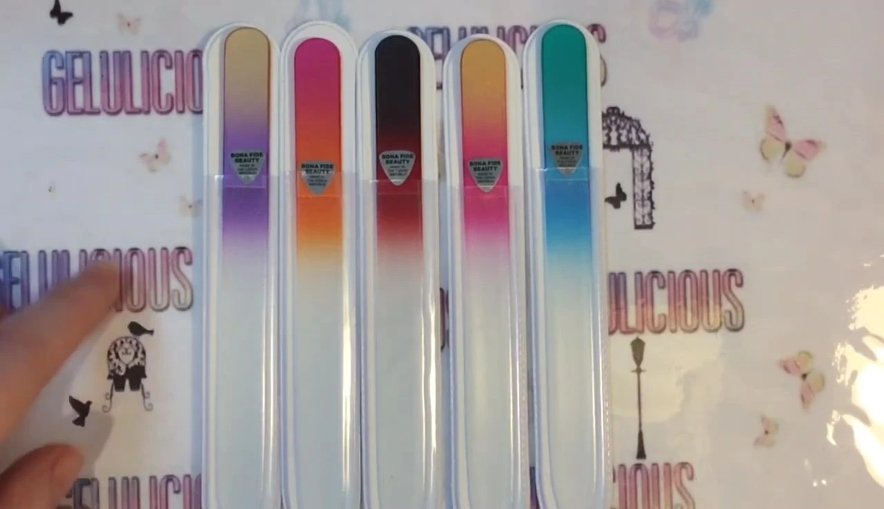 Close up shot showing the dimensions and double sided edge of a single nail file