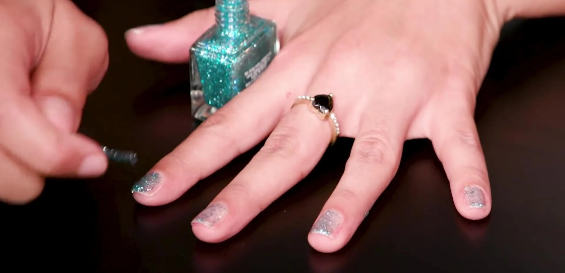 Peel-off glitter nail polish residue