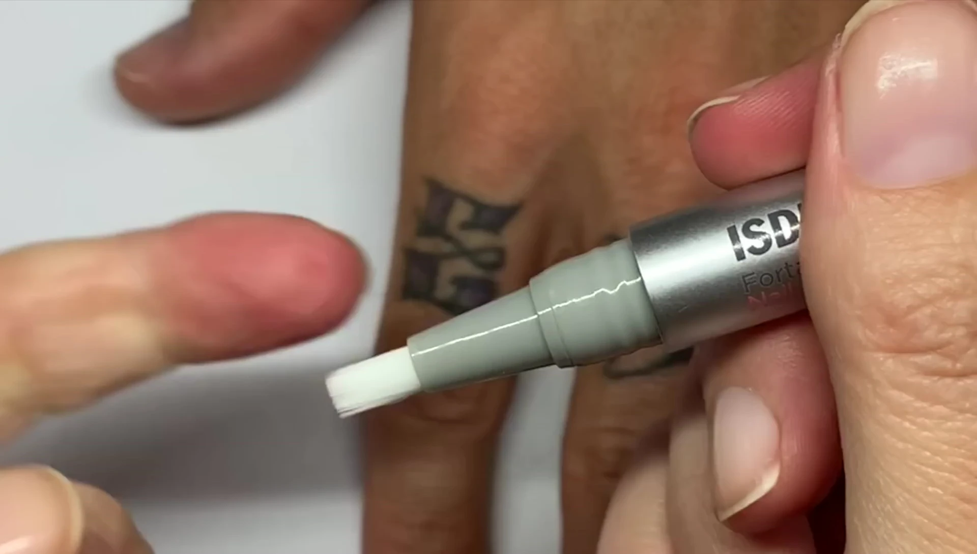 The brush applicator of the pen