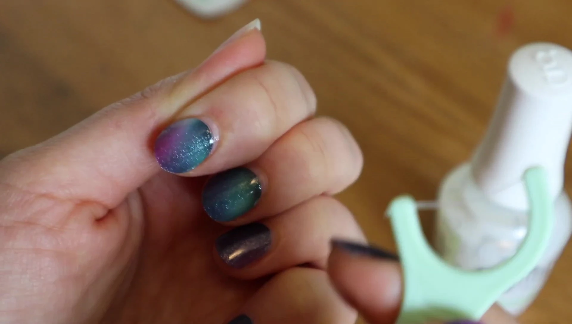 Removing nail strips with floss pick