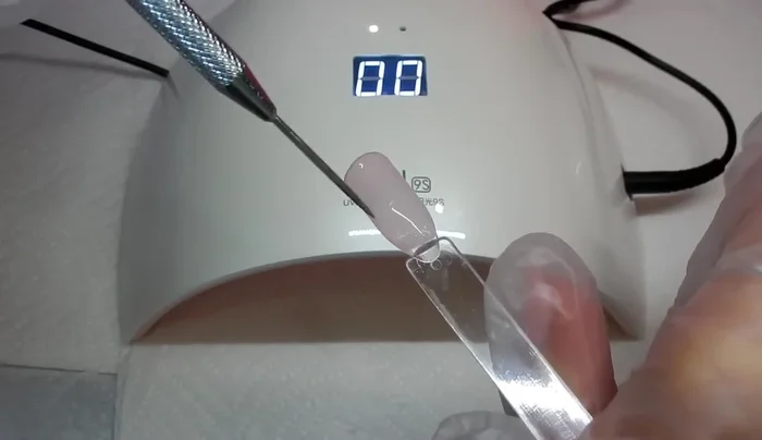Cure for 30 seconds under the Sun9S lamp.