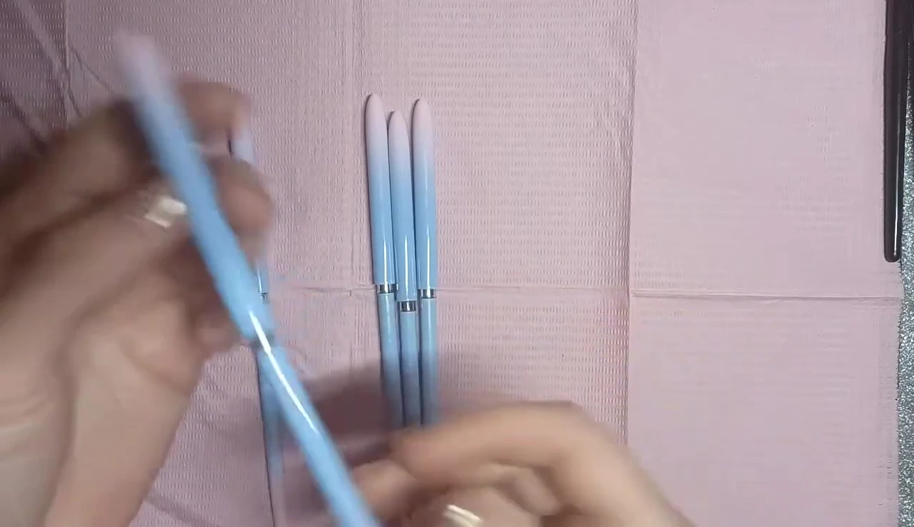 The brushes organized and numbered on display.