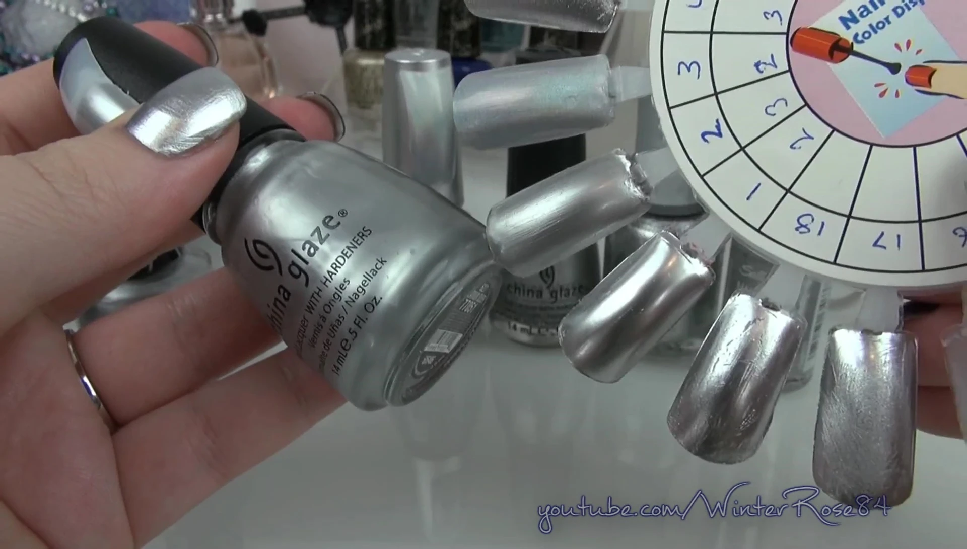 Comparison swatches of OPI Push & Shove and other silver polishes.