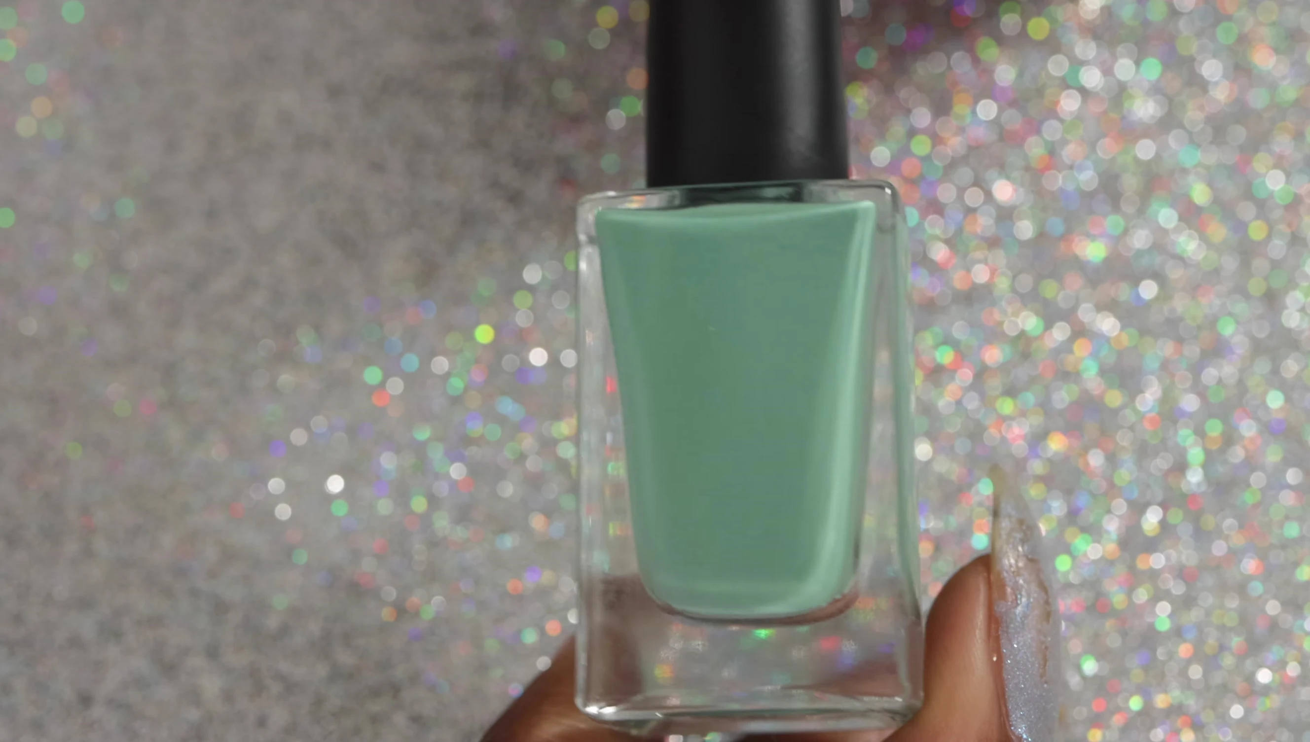 Swatches of Touch Grass showcasing its dusty sage green shade.