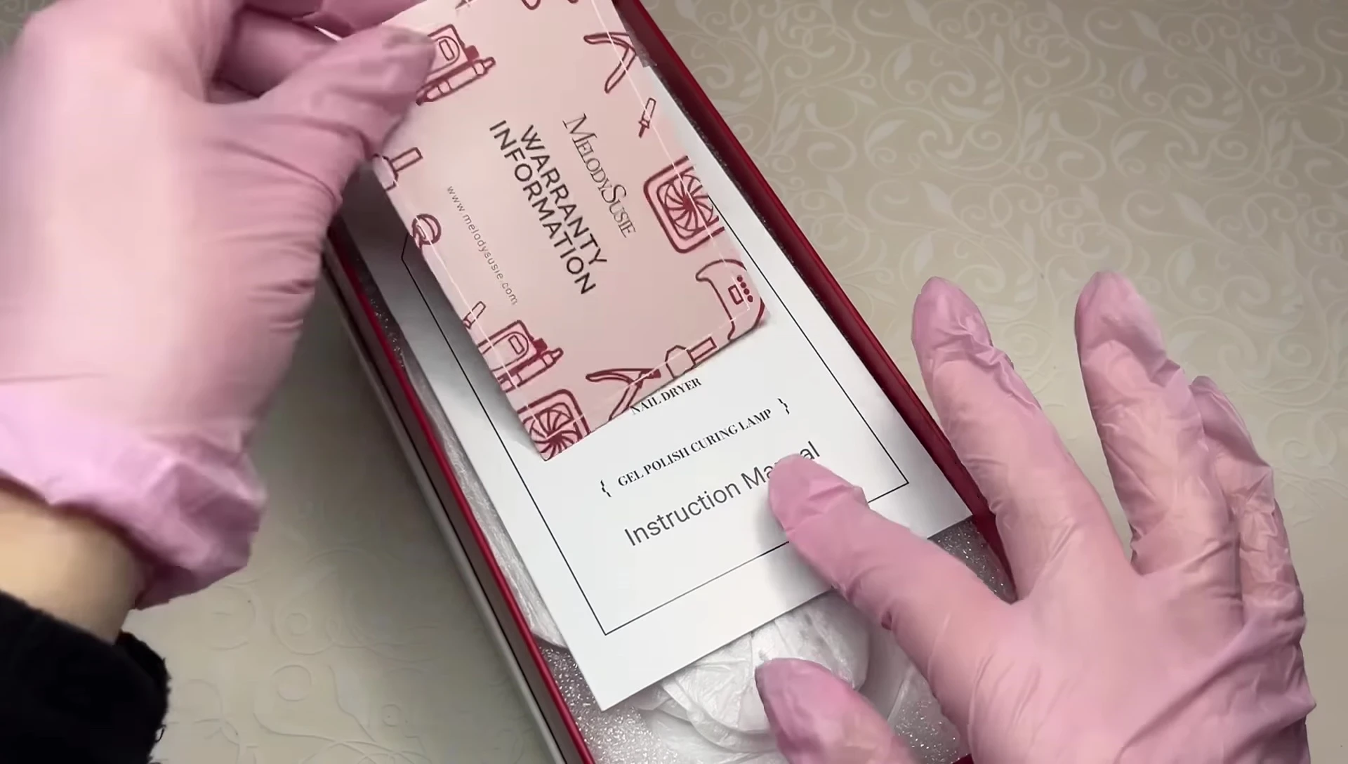 Close-up of the warranty card and instruction manual