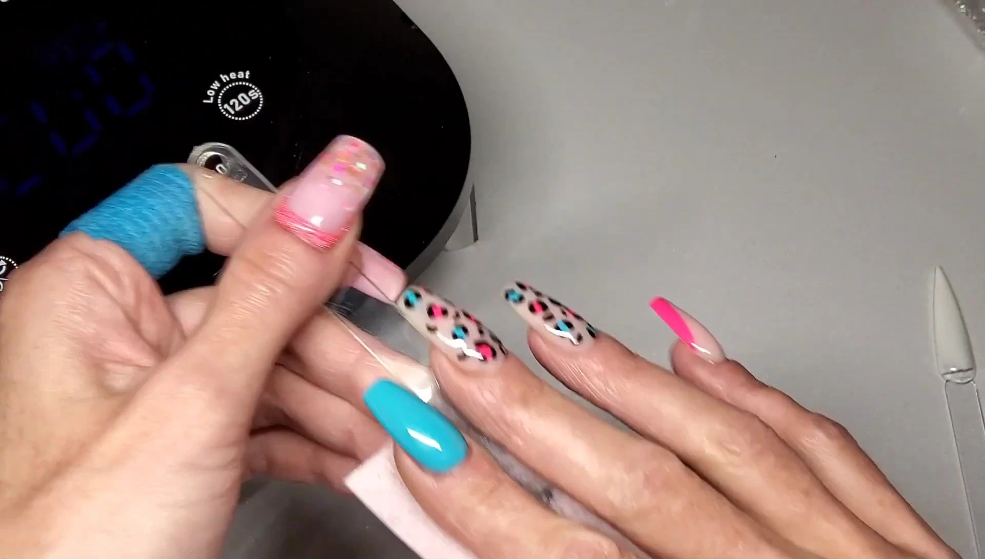 The cured black nail polish swatch, showing no wrinkling.