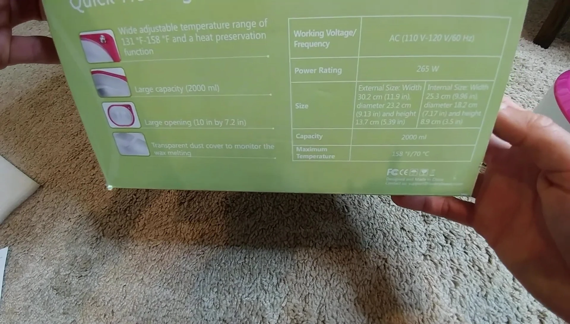 Close-up shot showcasing the warmer's specifications and capacity.