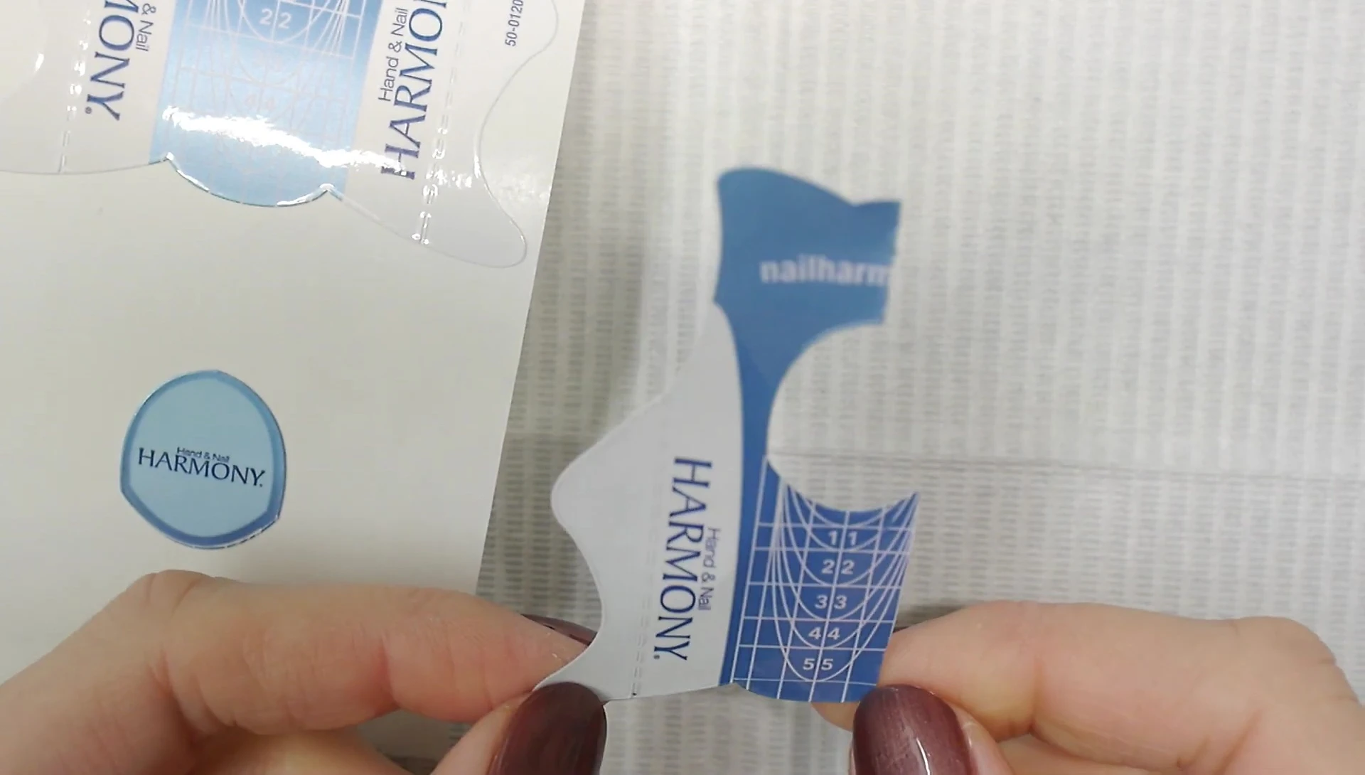 Two nail forms being prepared for modification.