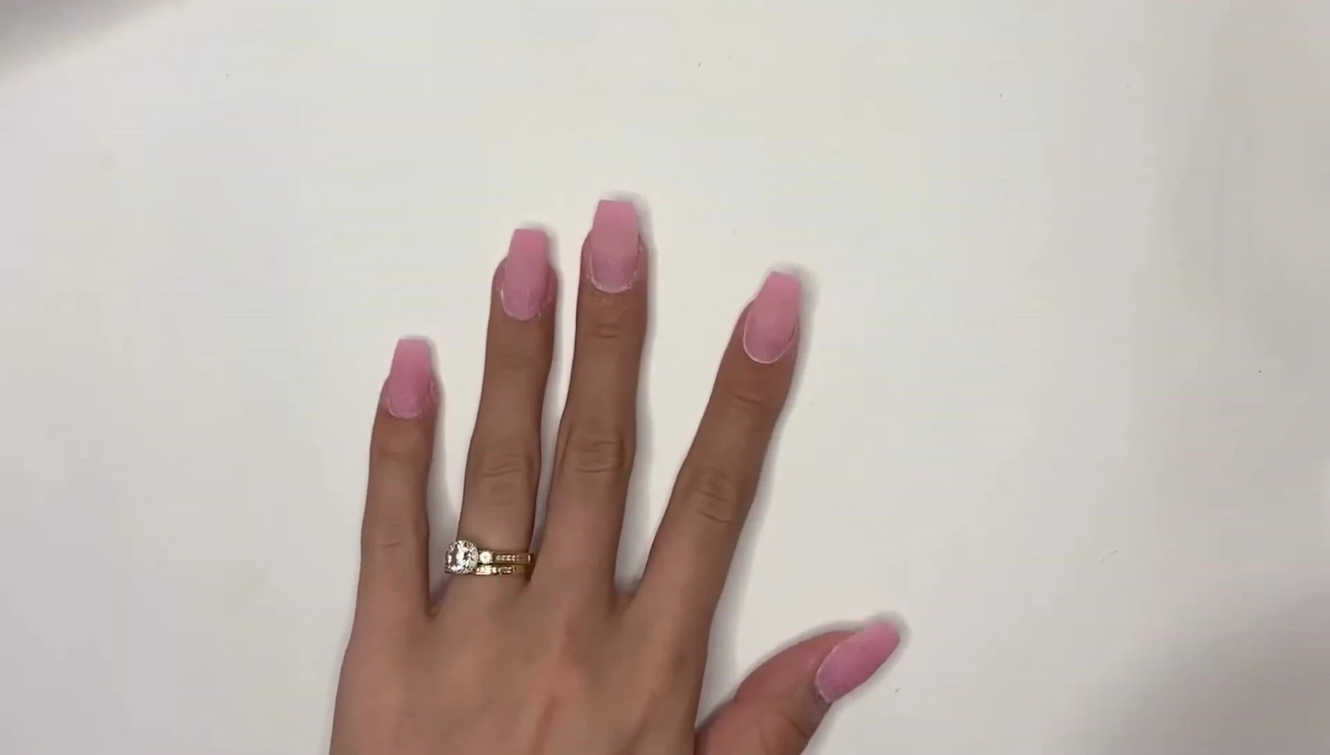 Applying no-wipe gel top coat.