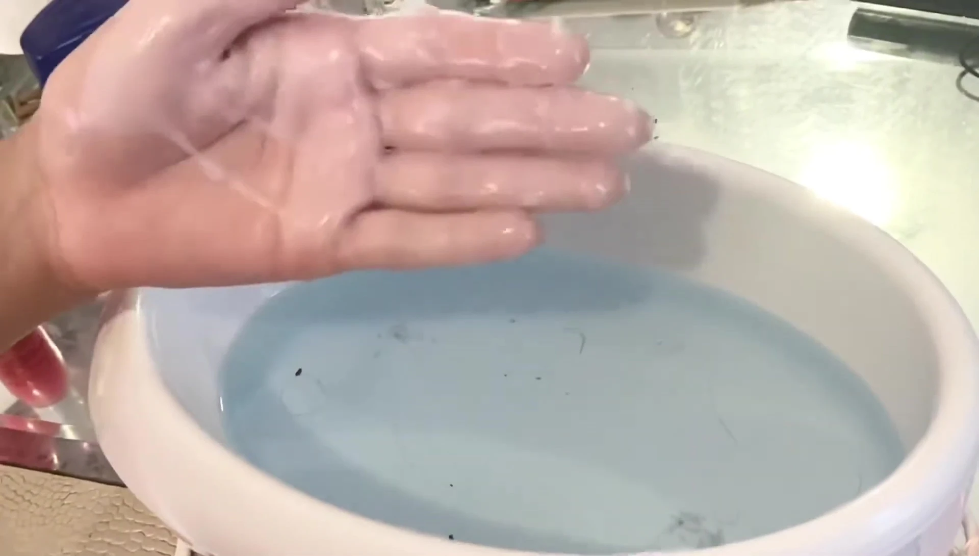 Layers of paraffin wax on the hand