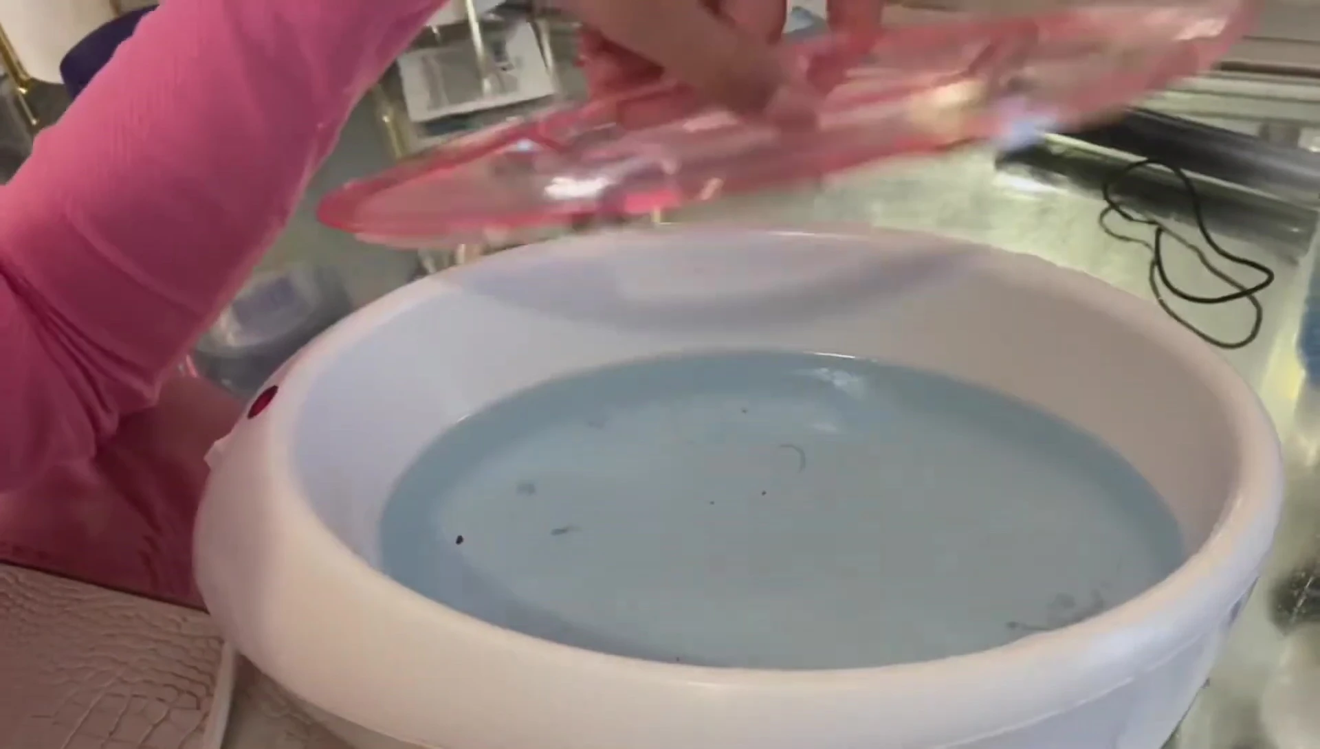 The melted paraffin wax in the machine, ready for use