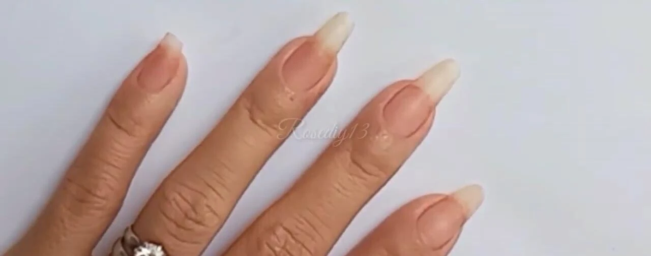 Cleaning nails before starting manicure