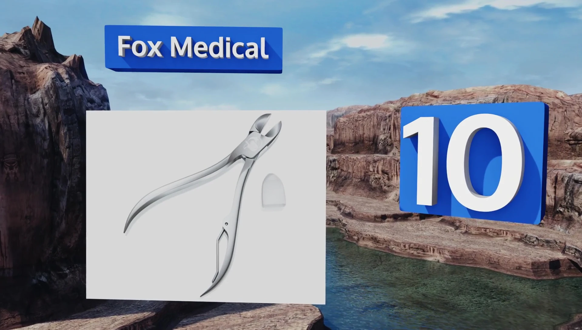 Hand holding the Fox Medical scissors, showcasing the ergonomic handles