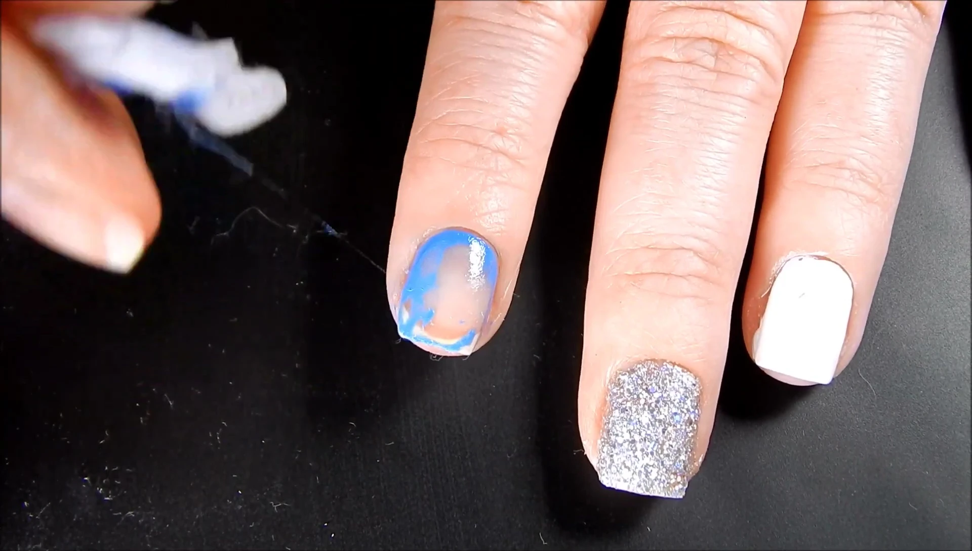 A nail after one pad has been used.