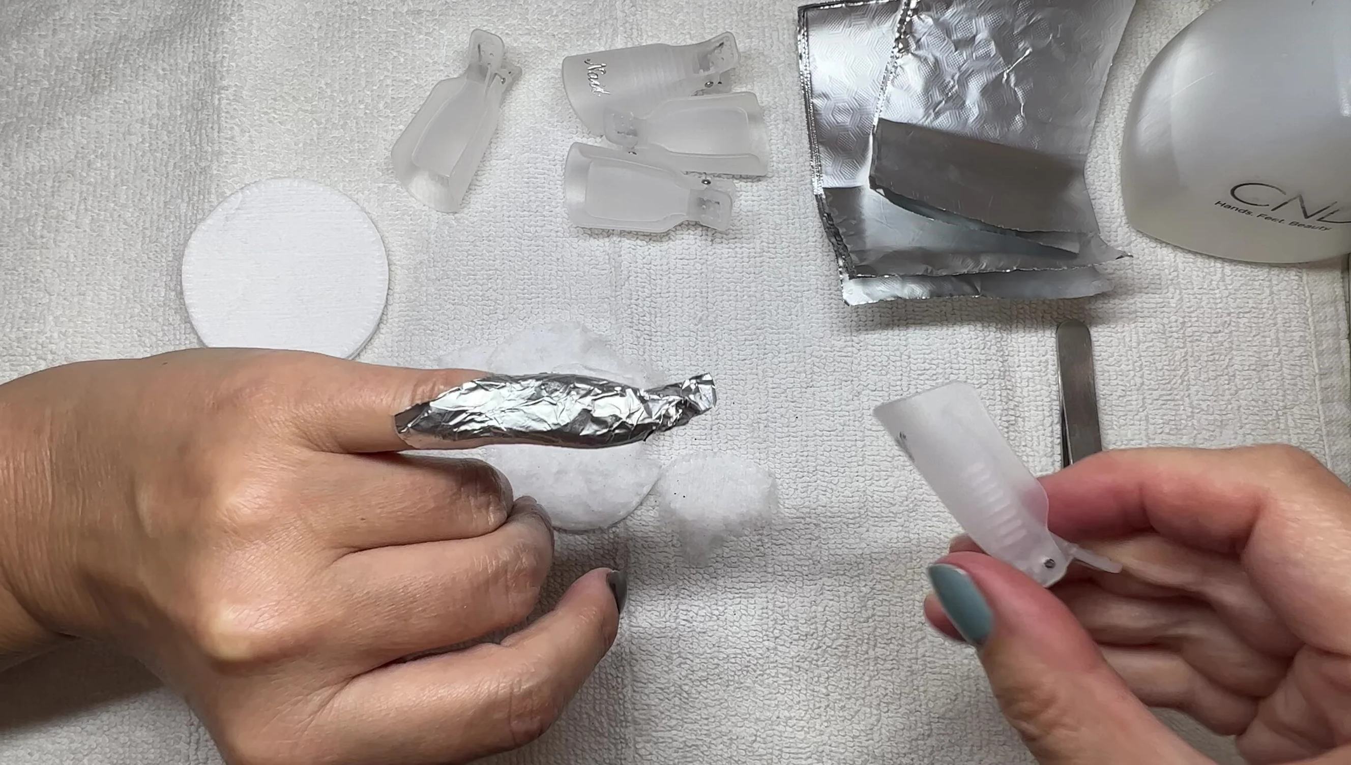 Foil wrapped around a nail.