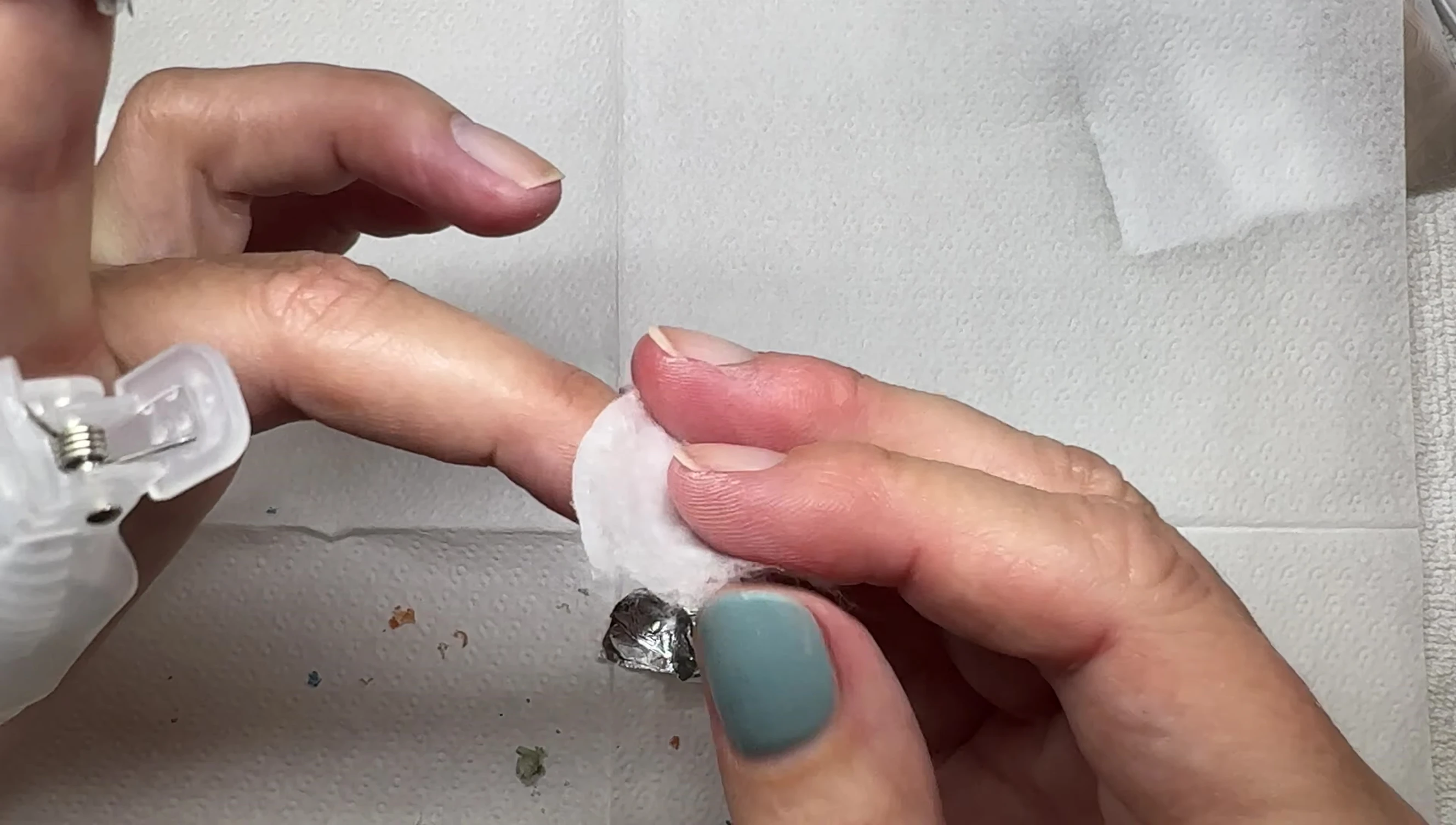 Reapplying acetone soaked cotton and foil.