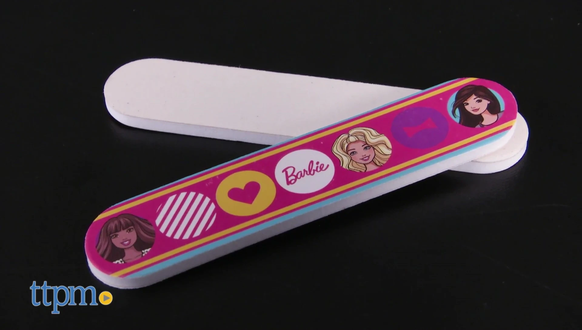 Close-up view of the nail files, toe separator and rings.