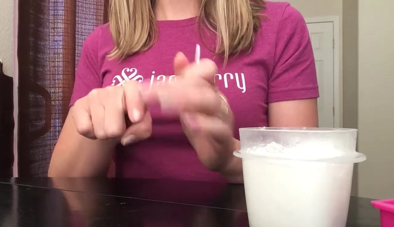Washing hands to remove any remaining oil