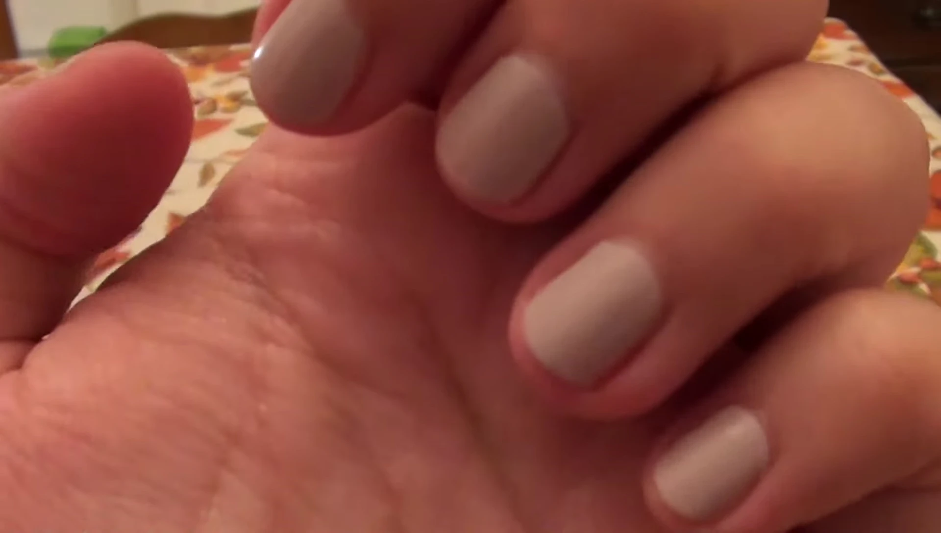 Close-up shot of the nails on the second day, showcasing the remarkable wear.