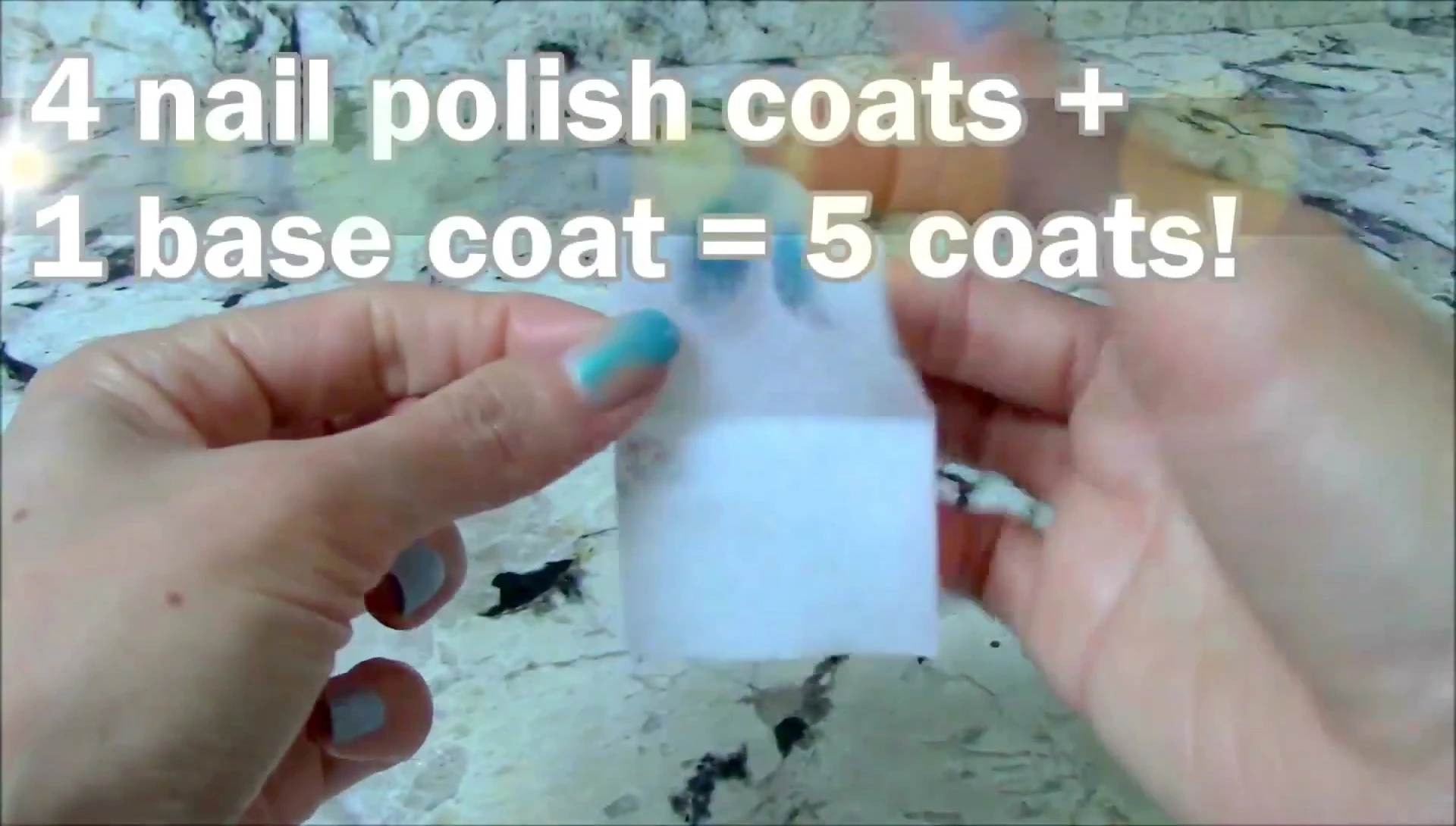 Close up of the nail polish being removed.