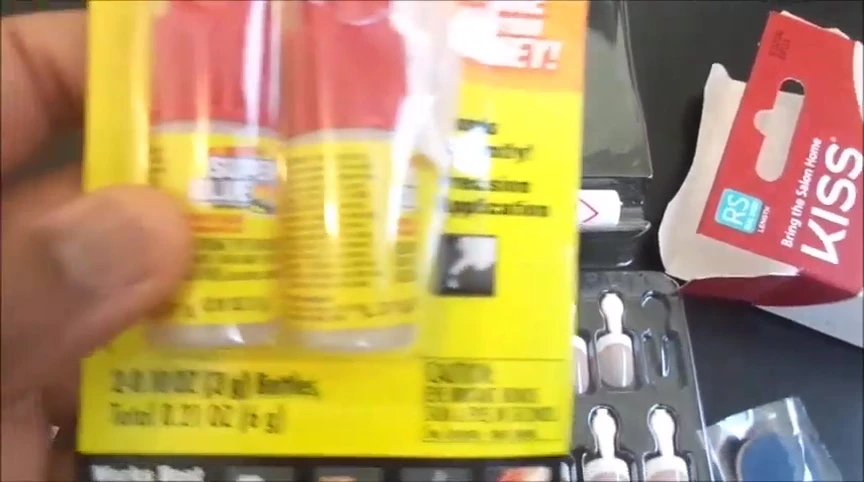 Showing the Kiss nail glue and the backup superglue.