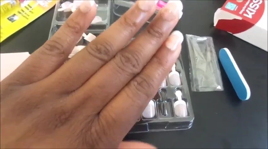 A full shot of one hand with the applied nails.
