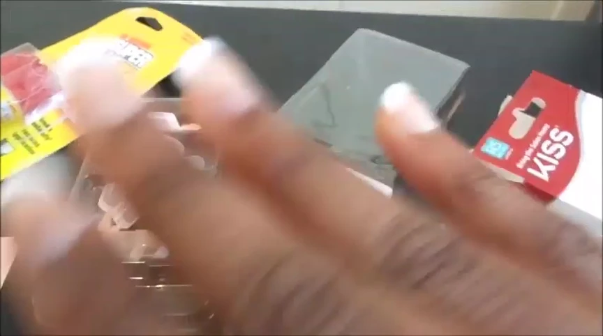 A full shot of both hands with the applied nails.