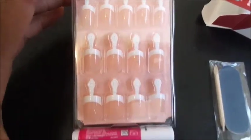 Showing the assortment of nail sizes inside the package.