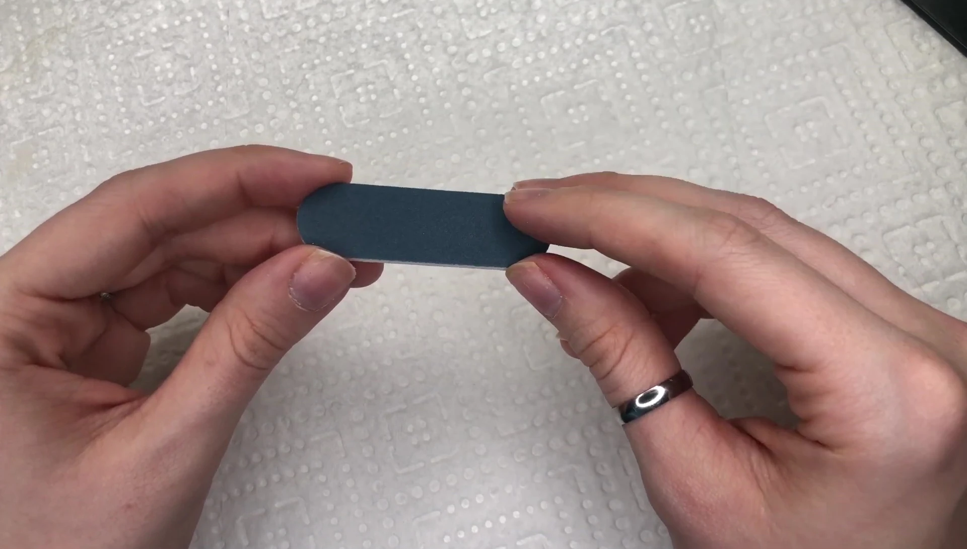 Filing nail tips with the double-sided file